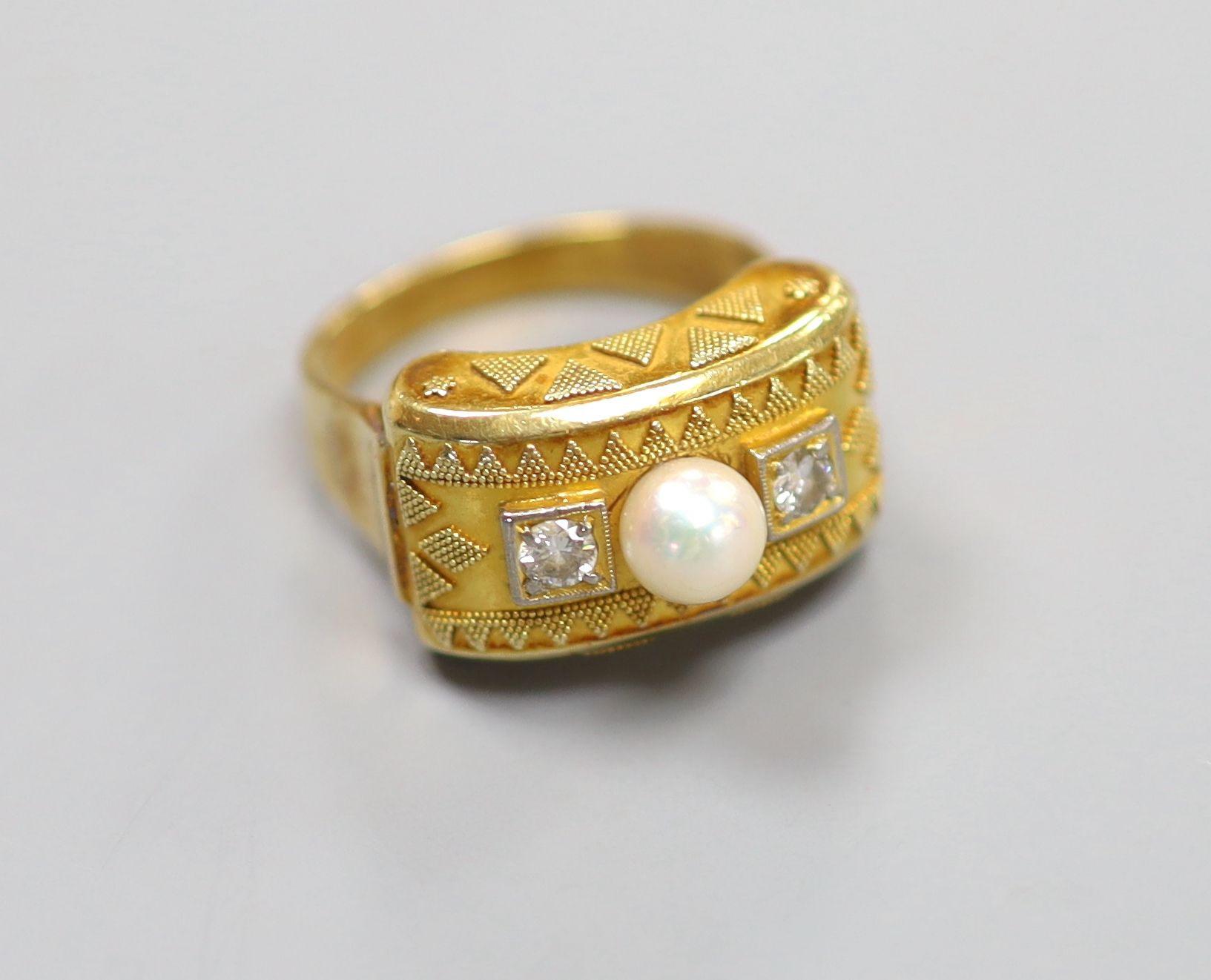 A 14ct gold, pearl and diamond-set tablet ring